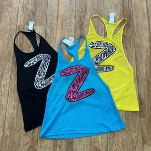 3 Zumba muscle tanks